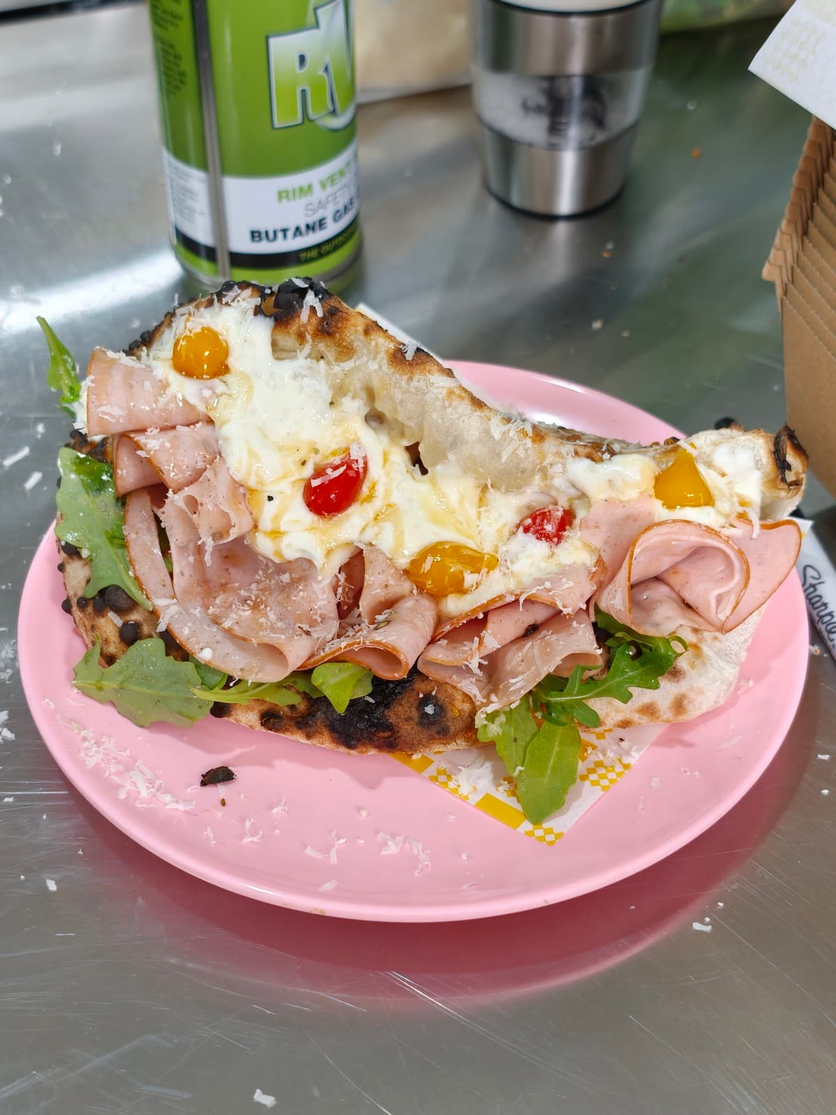 Mayhem Again Ozzo on a pink plate, three-quarter side shot