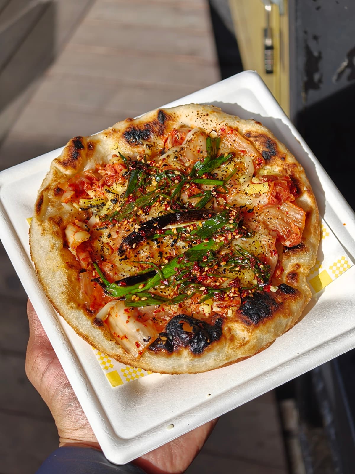 A Kimchi & Cheese Fritta — kimchi and melted cheese on pan-fried Neapolitan dough