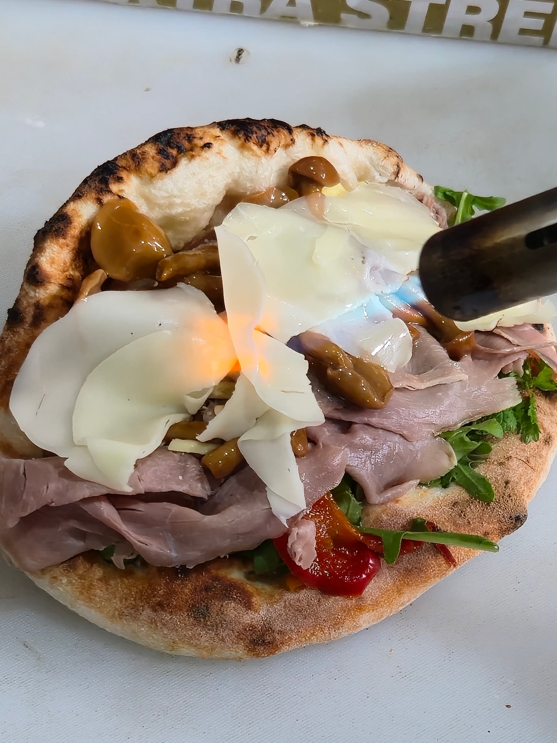 American Melt-down ozzo — roast beef, provolone and peppers on 72-hour bread, near the Lyric